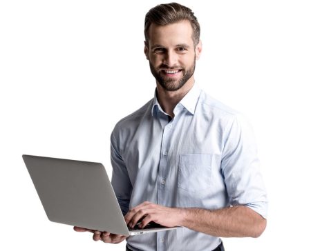 image of man holding a laptop