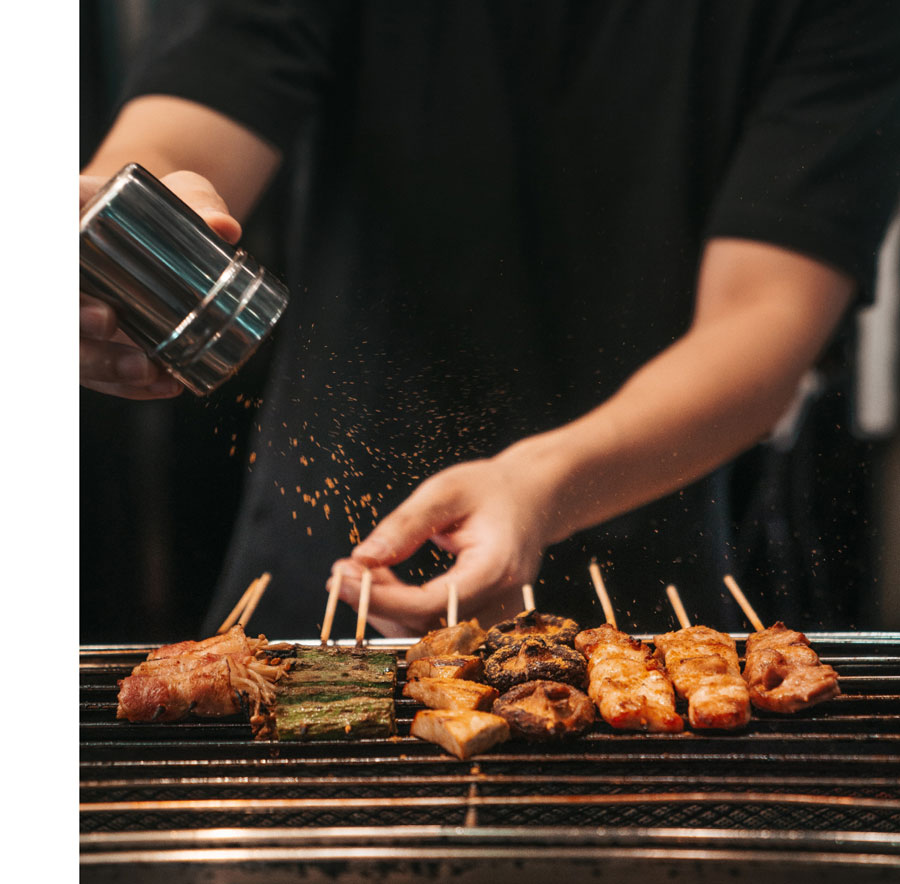 Man grills meat