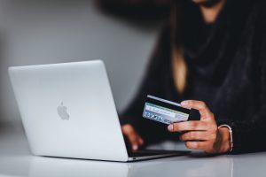 woman-holding-bank-card